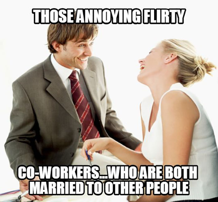 Flirty coworkers laughing together, both married to other people, creating a funny office scenario.