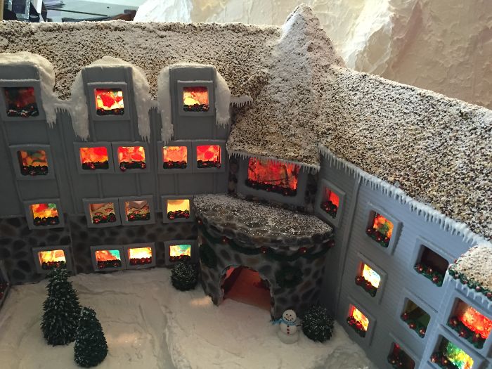 This Family Takes Gingerbread House Building To The Next Level, Destroys Them With An Axe Or Baseball Bat