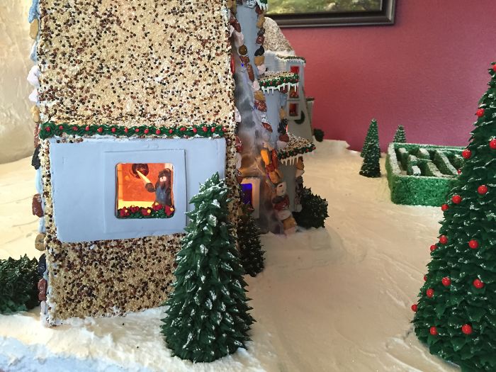 This Family Takes Gingerbread House Building To The Next Level, Destroys Them With An Axe Or Baseball Bat