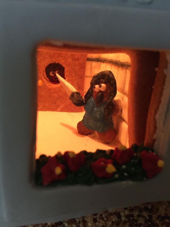 This Family Takes Gingerbread House Building To The Next Level, Destroys Them With An Axe Or Baseball Bat