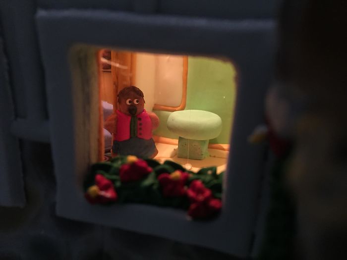 This Family Takes Gingerbread House Building To The Next Level, Destroys Them With An Axe Or Baseball Bat