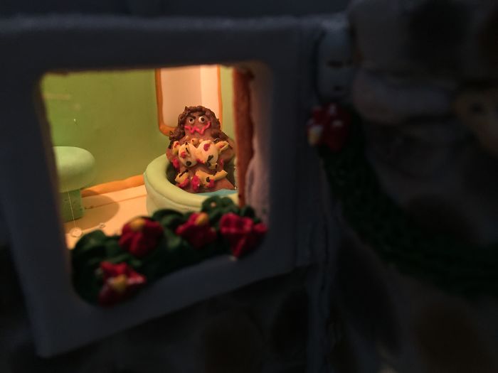 This Family Takes Gingerbread House Building To The Next Level, Destroys Them With An Axe Or Baseball Bat