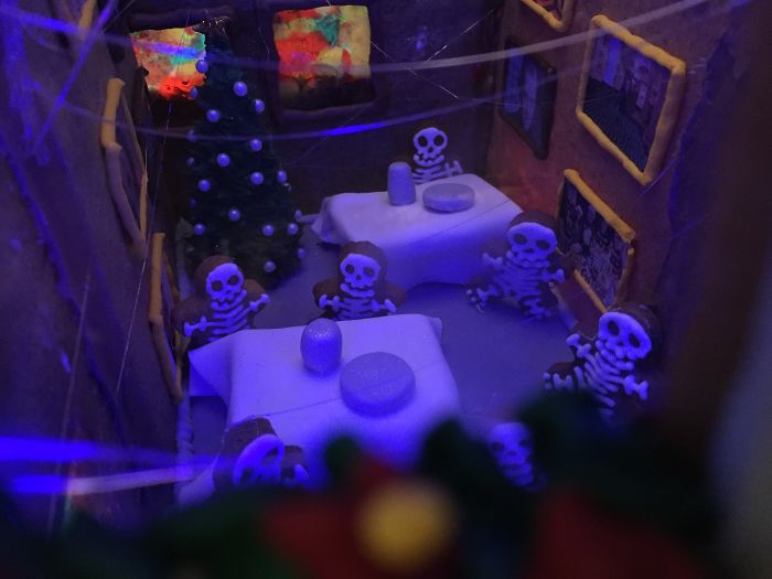 This Family Takes Gingerbread House Building To The Next Level, Destroys Them With An Axe Or Baseball Bat