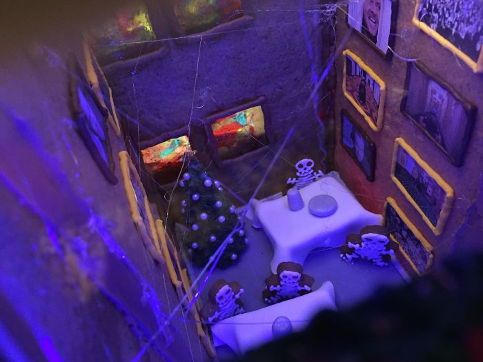 This Family Takes Gingerbread House Building To The Next Level, Destroys Them With An Axe Or Baseball Bat