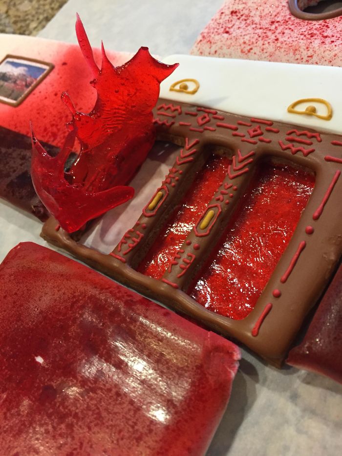 This Family Takes Gingerbread House Building To The Next Level, Destroys Them With An Axe Or Baseball Bat