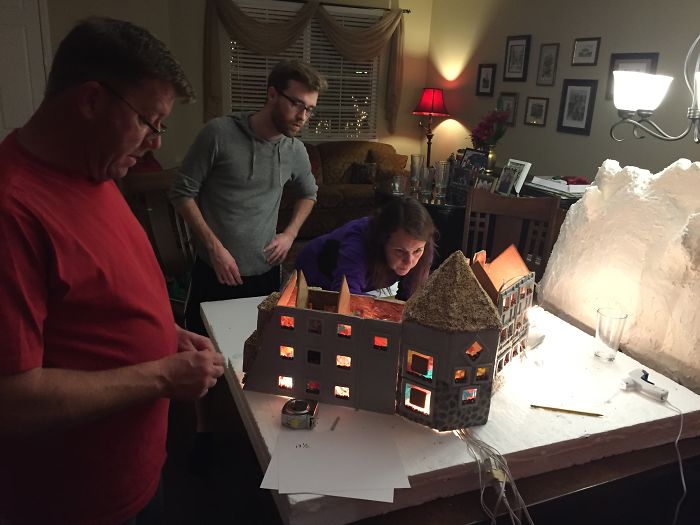 This Family Takes Gingerbread House Building To The Next Level, Destroys Them With An Axe Or Baseball Bat