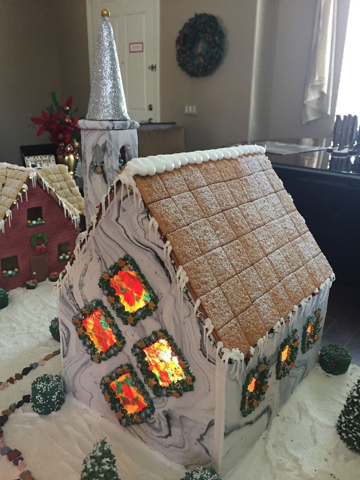 This Family Takes Gingerbread House Building To The Next Level, Destroys Them With An Axe Or Baseball Bat