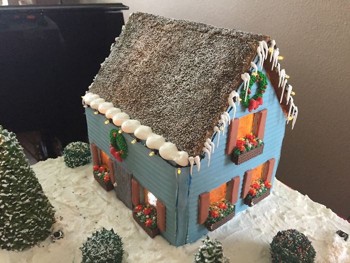 This Family Takes Gingerbread House Building To The Next Level, Destroys Them With An Axe Or Baseball Bat