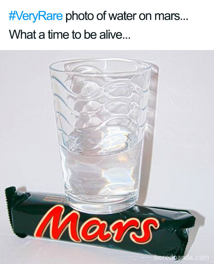 Glass of water on a Mars bar, humorously depicting water on Mars in a space meme.