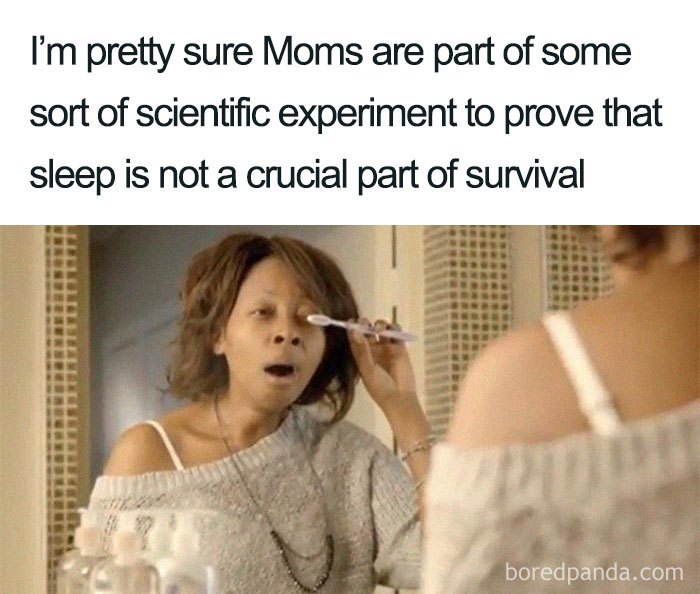 A mom applying makeup and yawning, capturing a humorous take on the exhaustion moms experience.