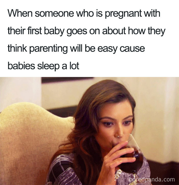 Woman sipping wine with a skeptical expression in a funny pregnancy meme about new parents' expectations.
