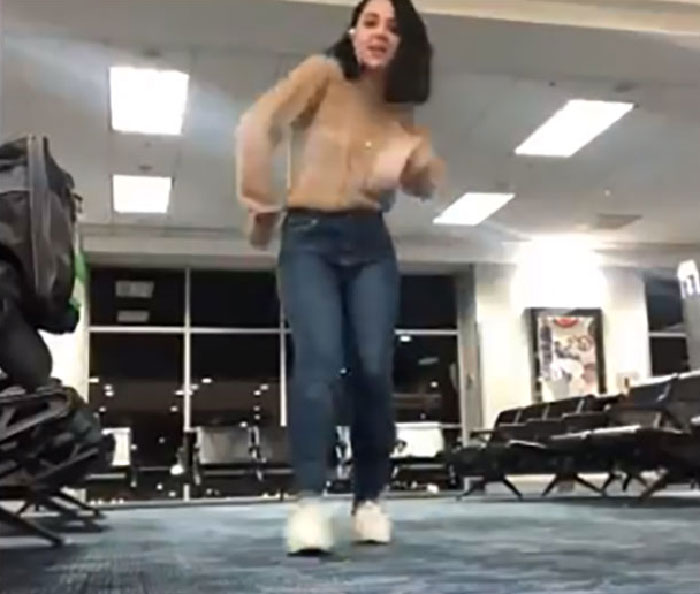 This Woman's Flight Was Canceled For 4 Hours, So She Decided To Entertain Herself By Dancing In An Airport With A Cat This Woman's Flight Was Canceled For 4 Hours, So She Decided To Entertain Herself By Dancing In An Airport With A Cat