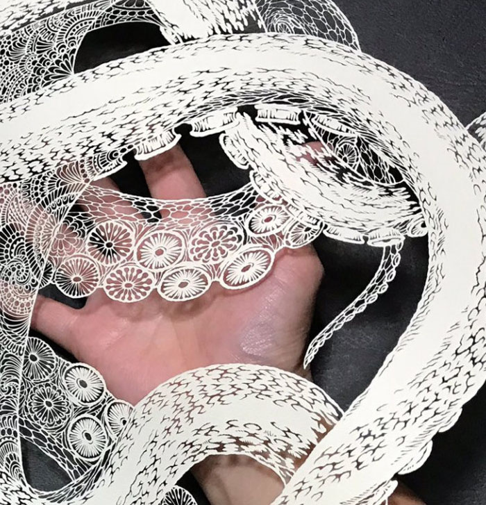 Japanese Artist Hand-Cuts Octopus From A Single Sheet Of Paper, And It’s Even More Impressive From Up Close Japanese Artist Hand-Cuts Octopus From A Single Sheet Of Paper, And It’s Even More Impressive From Up Close