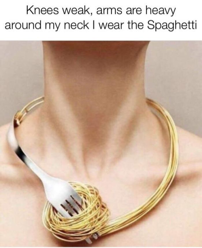 Person wearing spaghetti and fork necklace, showcasing a fashion disaster turned hilarious meme.