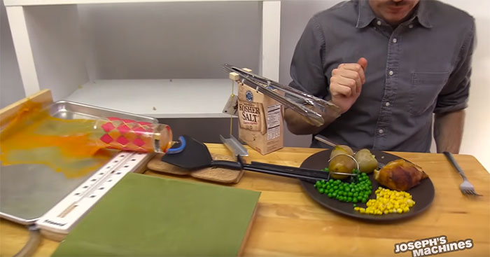 Guy Builds And Films A Chain-Reaction Machine In His Dining Room And You Won't Believe It's Not Edited Guy Builds And Films A Chain-Reaction Machine In His Dining Room And You Won't Believe It's Not Edited