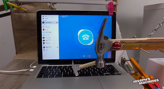 Guy Builds And Films A Chain-Reaction Machine In His Dining Room And You Won't Believe It's Not Edited