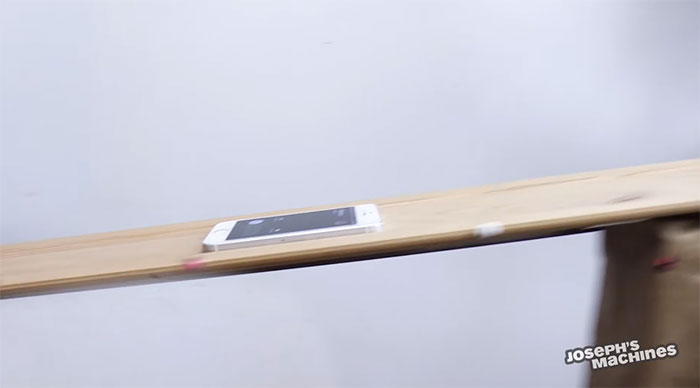 Guy Builds And Films A Chain-Reaction Machine In His Dining Room And You Won't Believe It's Not Edited