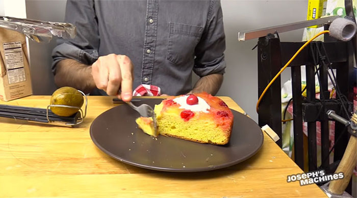 Guy Builds And Films A Chain-Reaction Machine In His Dining Room And You Won't Believe It's Not Edited