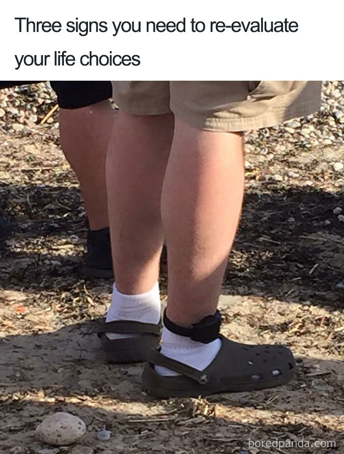 Man wearing socks with Crocs and a monitor; example of fashion disasters turned into memes.