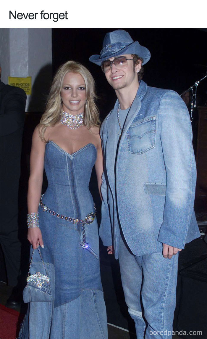 A couple in matching denim outfits at an event, showcasing a memorable fashion disaster for memes.