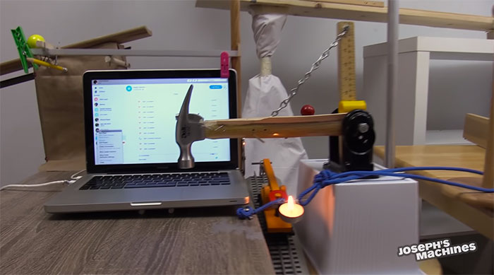 Guy Builds And Films A Chain-Reaction Machine In His Dining Room And You Won't Believe It's Not Edited