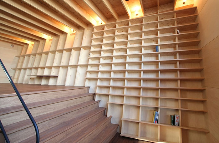 Japanese Architect Presents A Special Bookshelf For Book Lovers Who Live In Seismic Zones