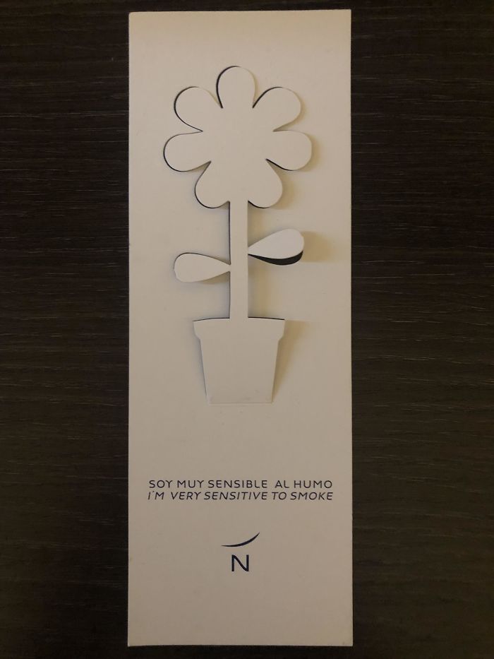 This Paper Cutout In My Hotel In Madrid That Changes Color If You Smoke In Your Room