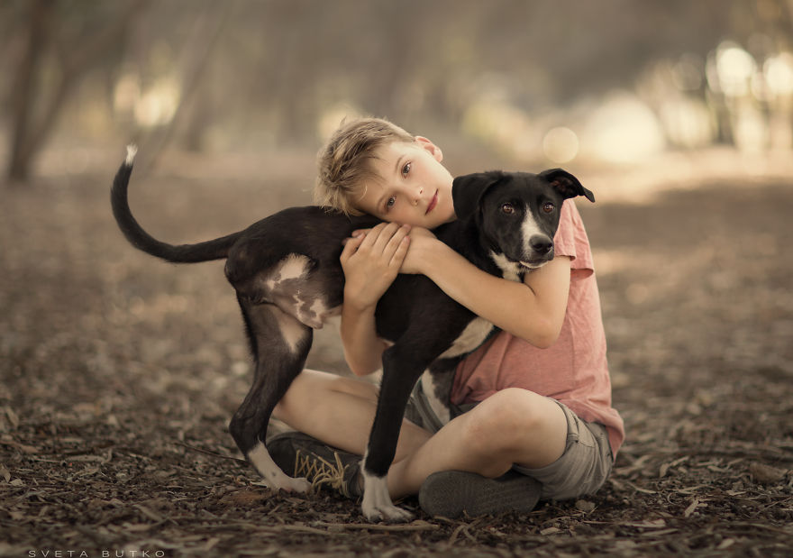 A Boy And A Dog Who Doesn't Have Legs