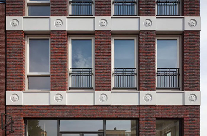 22 Emoji Decorate An Apartment Building As Modern Day 'Gargoyles'