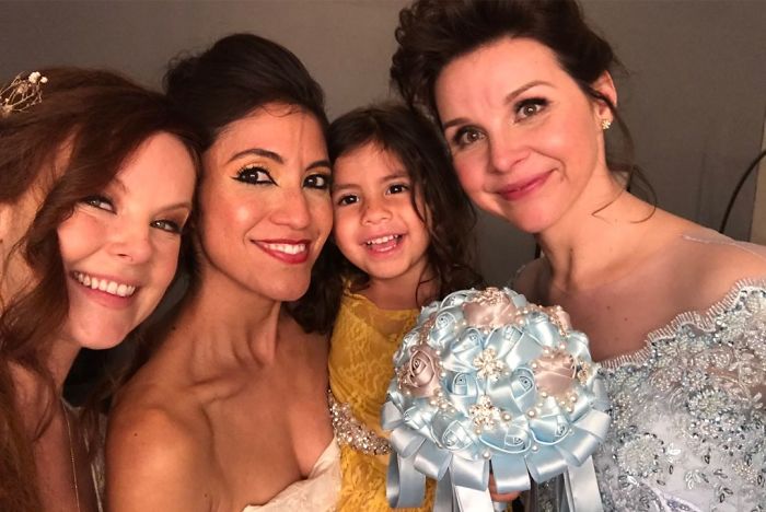 Couple Has An "Unusual" Wedding Where Guests Get To Wear Their Old Bridal Dresses Again