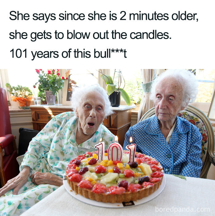 Two elderly siblings humorously argue over who blows out birthday candles on a 101st cake.