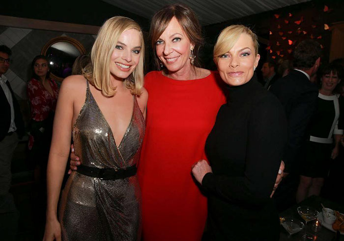 Three women posing together at an event; two resemble each other closely. Three women posing together at an event; two resemble each other closely.
