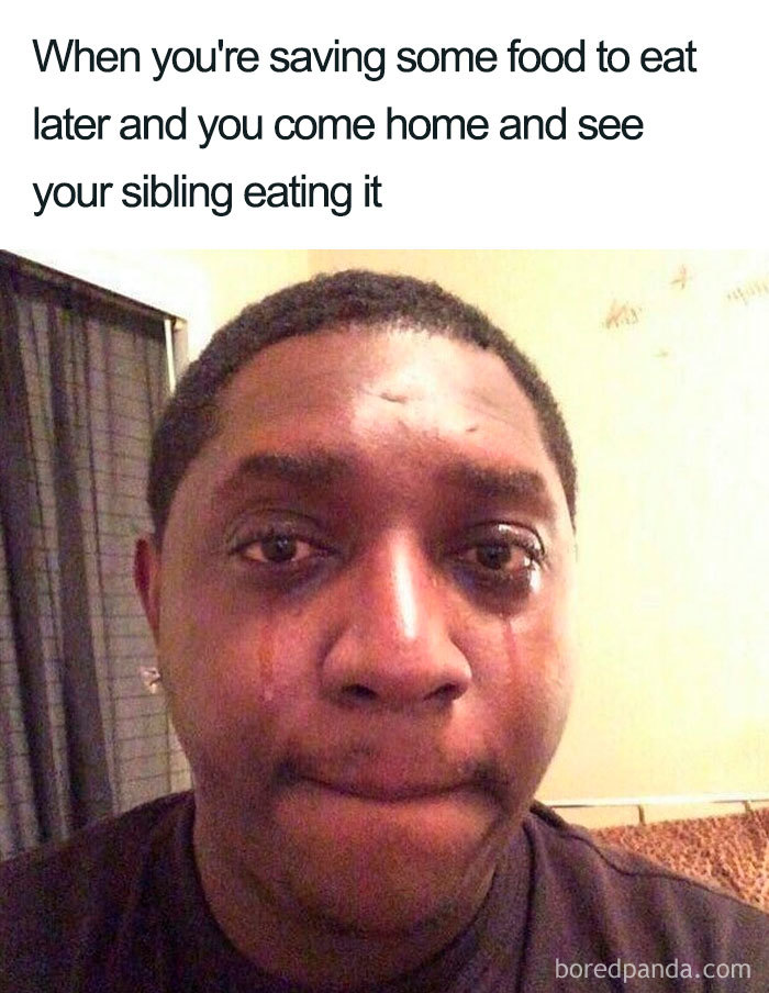 Crying person reacting to sibling eating saved food, a classic sibling meme moment.
