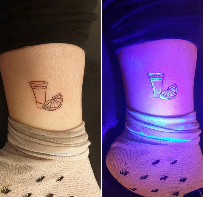 UV tattoo design of a shot glass and lime on an ankle, glowing under UV light.
