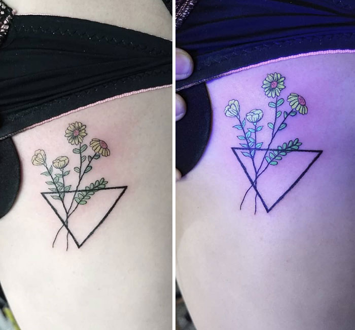 UV tattoo design of flowers in geometric shapes, glowing under black light.