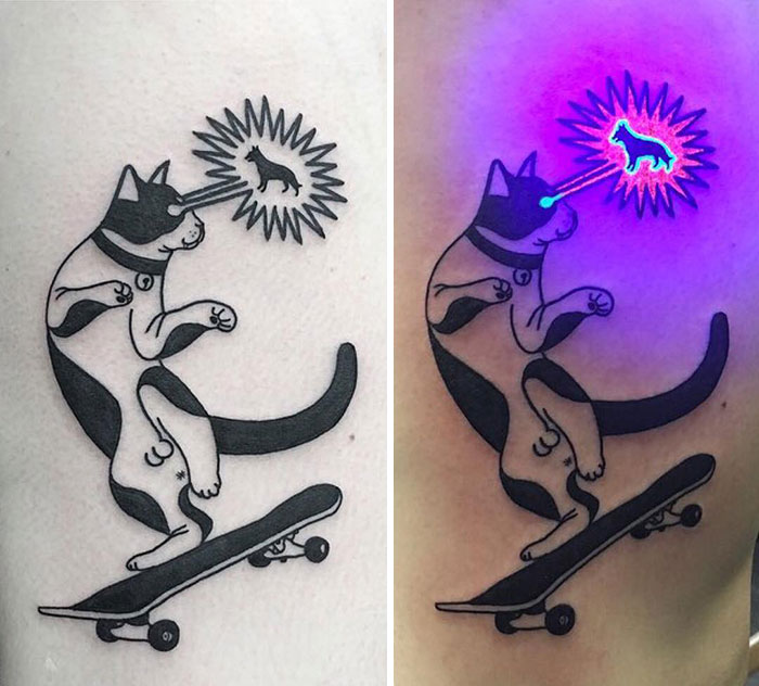 Cat on skateboard UV tattoo design glowing under blacklight.