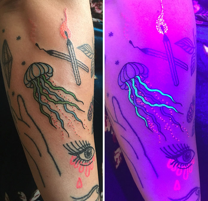 Jellyfish UV tattoo glowing under blacklight, showcasing vibrant colors and intricate design.