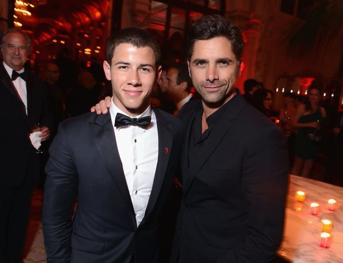 Nick Jonas And John Stamos Are Hilariously Trolling Each Other Nick Jonas And John Stamos Are Hilariously Trolling Each Other