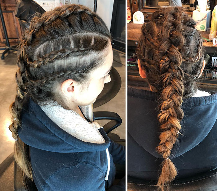 Braided Viking hairstyles on a woman in a salon, showcasing fierce modern Viking-inspired hair fashion.