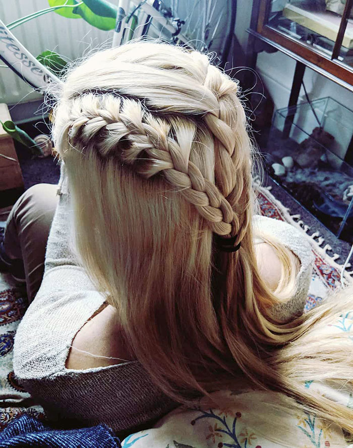 Intricate Viking braid hairstyle on blonde hair for a modern-day Valkyrie look.
