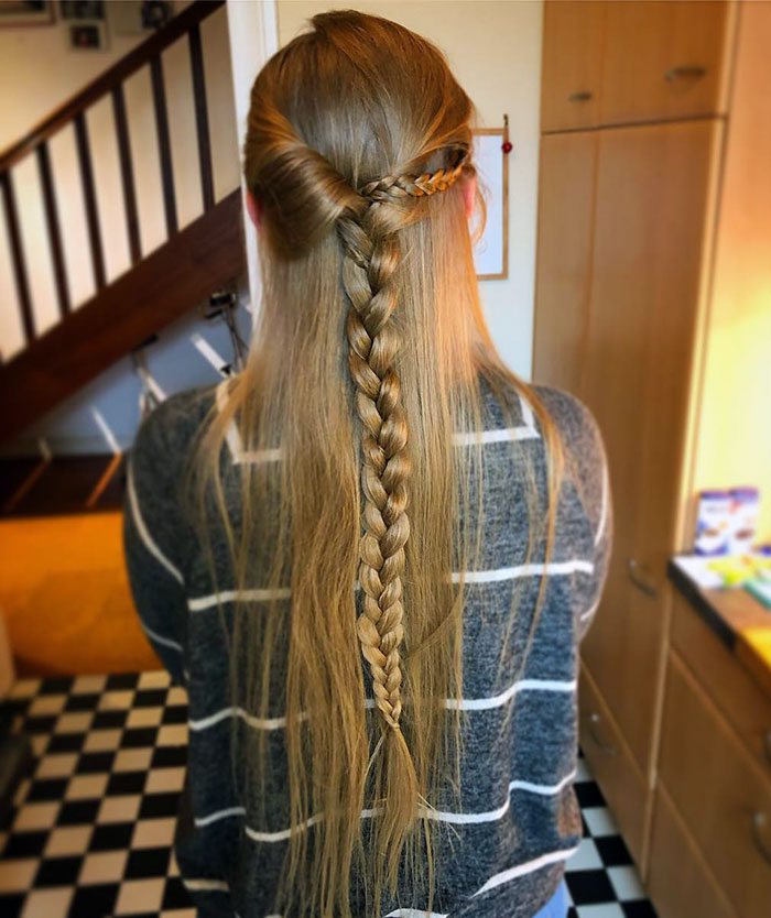 Long braided Viking hairstyle with a twisted knot, perfect for modern day valkyries.
