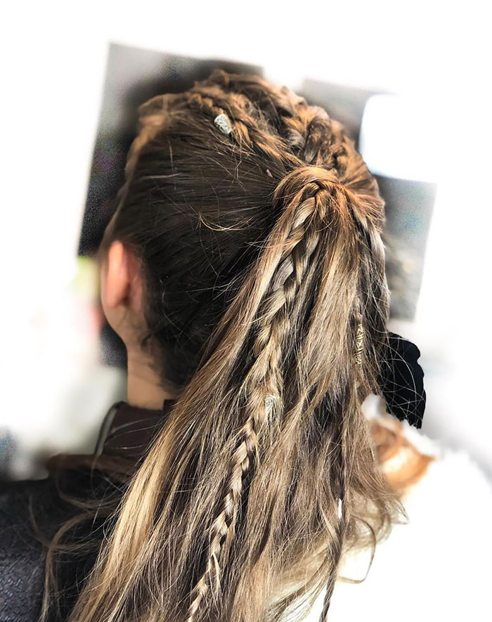 Braided Viking hairstyle with intricate twists for a modern look.