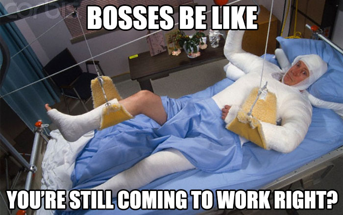 Person in a full-body cast in a hospital bed with the text "Bosses be like: You're still coming to work right?" for boss memes.