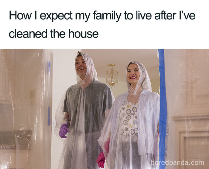 Two people in raincoats with pleased expressions, illustrating a humorous cleaning meme.