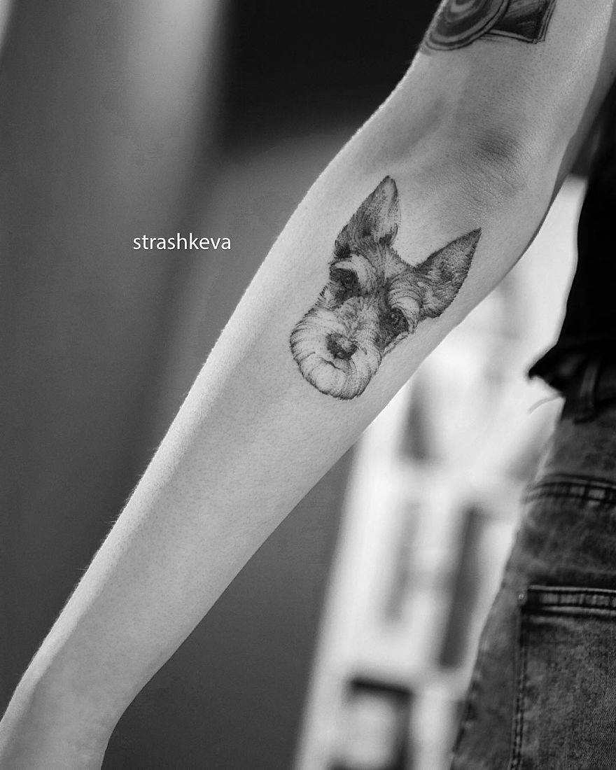Detailed dog tattoo on a forearm by a talented Lublin, Poland tattoo artist.