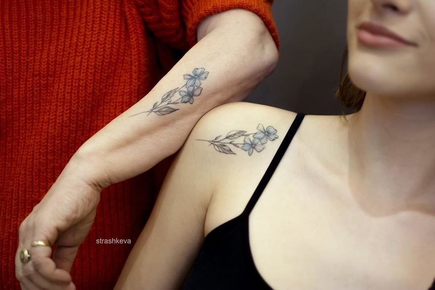 Floral tattoos by Lublin artist, one on an arm in a red sweater, another on a woman's shoulder in a black top.