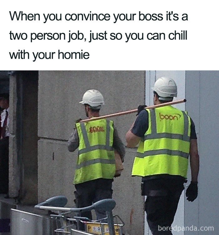 Two construction workers with safety vests and helmets creatively taking a break, embodying a funny boss meme.