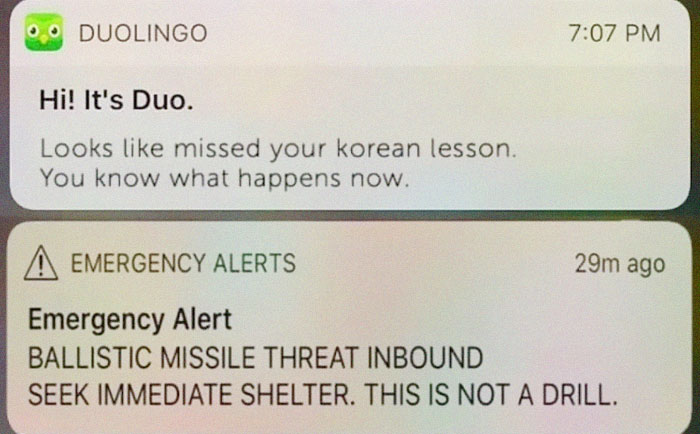 Duolingo notification humorously paired with a missile alert, playing on language lesson reminders.