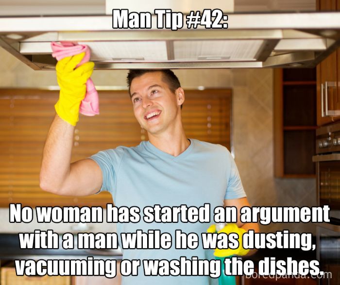 Man cleaning kitchen hood with a cloth, caption about avoiding arguments while doing chores.
