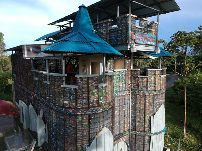 Man Builds Homes Out Of Plastic Bottles And They Look Just Like Regular Houses